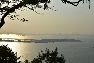 Scenic view of sea against sky at sunset