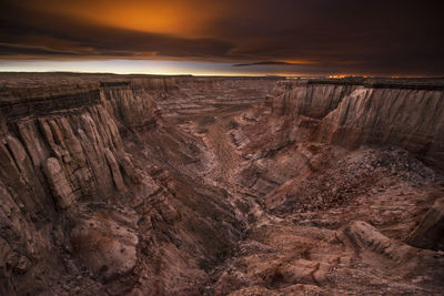 Epic sunrise aerial panorama above massive coal mine canyon on n