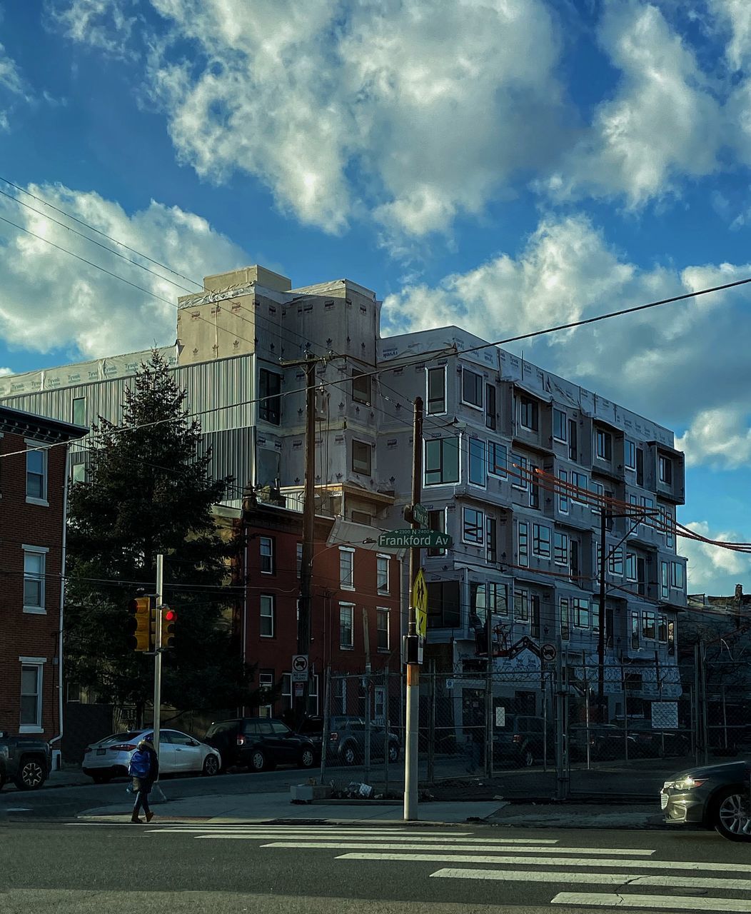 CITY STREET AGAINST SKY