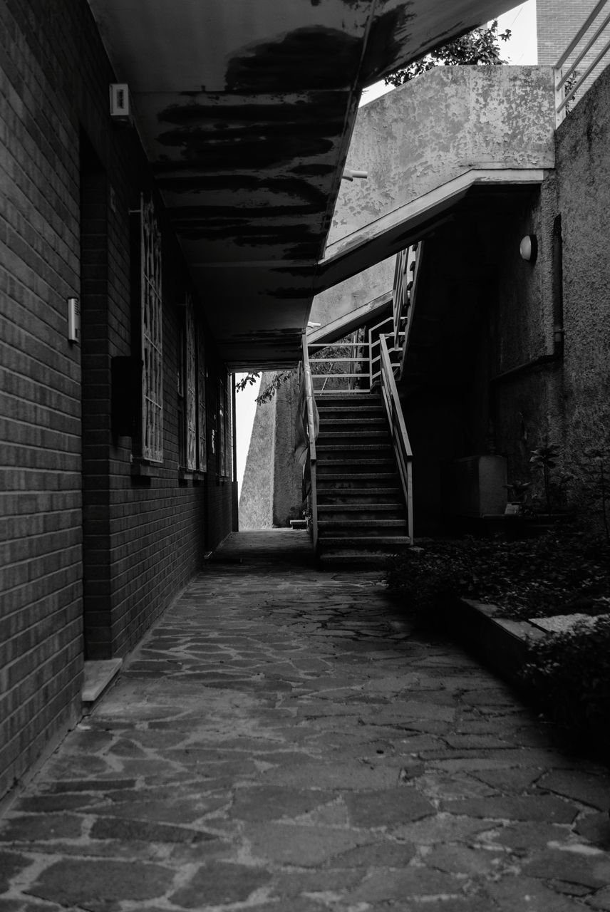 architecture, black, built structure, darkness, alley, white, black and white, monochrome, building, monochrome photography, staircase, street, the way forward, house, road, no people, urban area, wall - building feature, indoors, light, infrastructure, steps and staircases, stairs, abandoned, day, wall, entrance, old, corridor, footpath