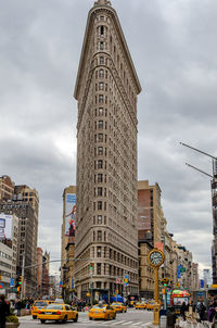 Low angle view of skyscrapers against sky