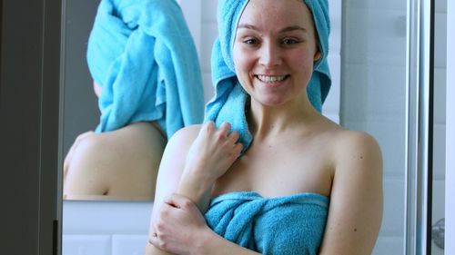 Portrait of smiling young woman