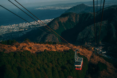 Scenic view of mountains and cable car