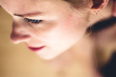 Close-up of young woman looking away