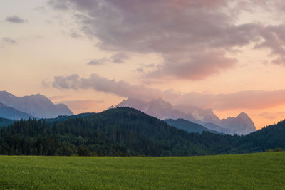 Scenic view of landscape against sky during sunset