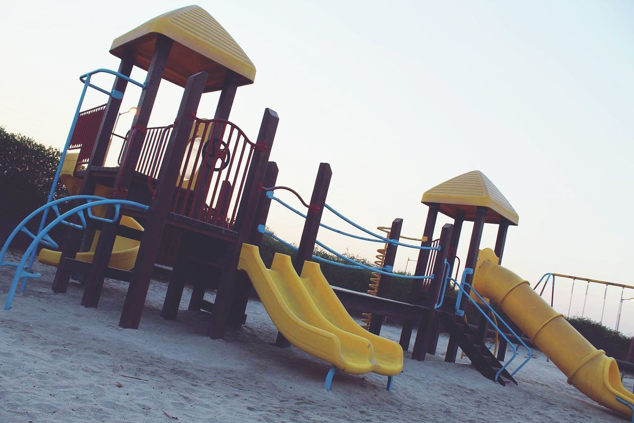 LOW ANGLE VIEW OF PLAYGROUND AGAINST SKY