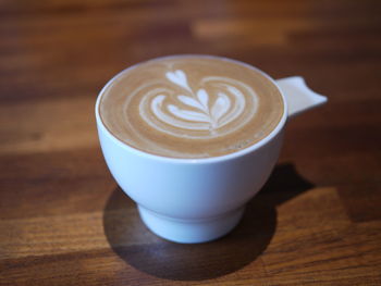 Close-up of cappuccino on table