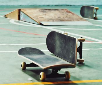 Close-up of skateboard at skateboard park