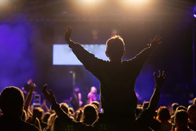 Group of people at music concert