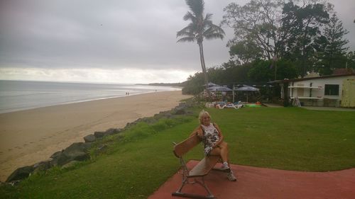 Scenic view of sea against cloudy sky