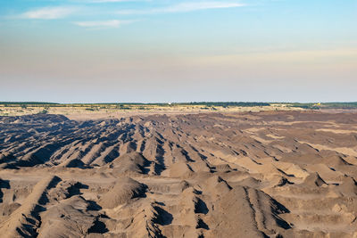 Scenic view of desert against sky