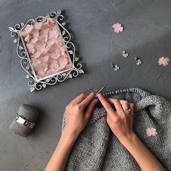 Close-up of woman knitting wool