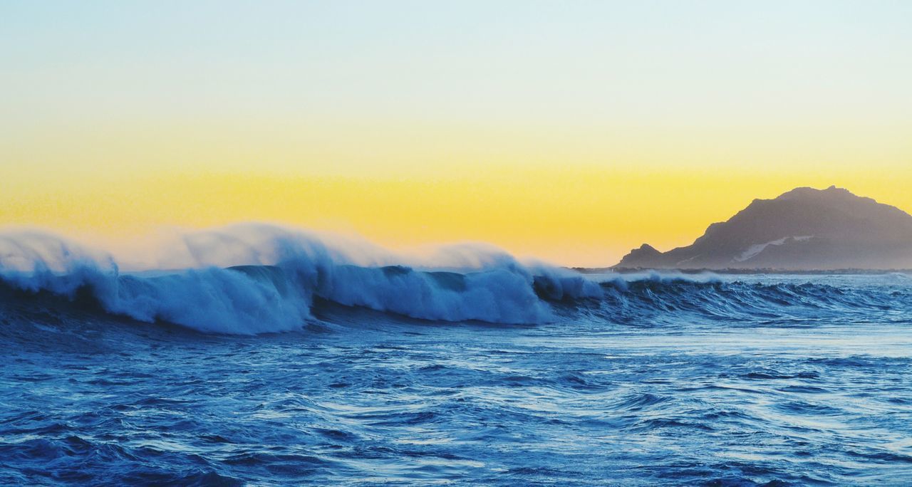 sea, nature, beauty in nature, waterfront, water, sunset, no people, scenics, clear sky, wave, outdoors, day