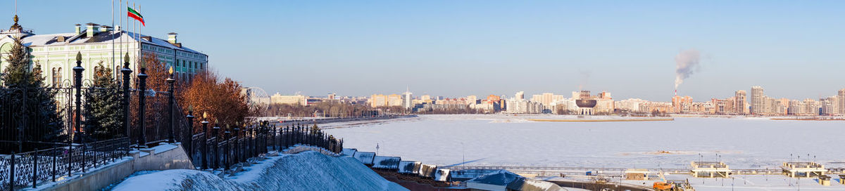 Buildings in city during winter