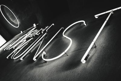 High angle view of illuminated lighting equipment on table