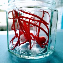 Close-up of glass jar on table