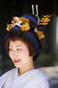 Portrait of beautiful young woman in temple