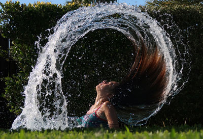 Full frame shot of water splashing on grass