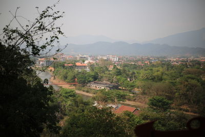 View of townscape and mountain against sky