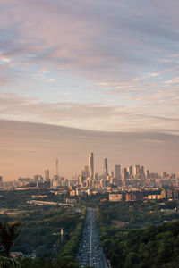 Cityscape against sky during sunset