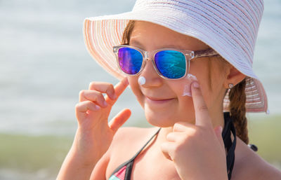 Portrait of woman wearing sunglasses