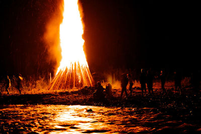 Bonfire on landscape at night