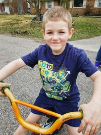 Portrait of boy playing outdoors