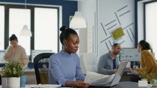 Business colleagues working at office