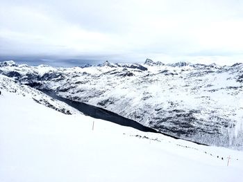 Scenic view of snowcapped mountains