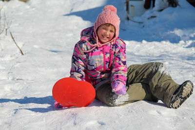 Portrait of cute girl in snow