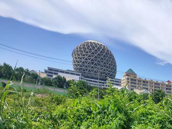 Low angle view of modern buildings against sky