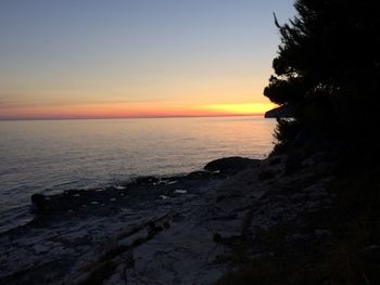 Scenic view of sea during sunset