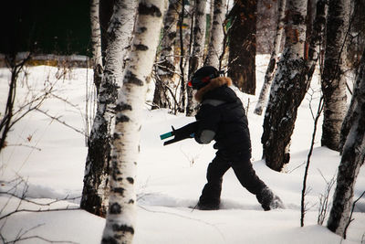 Full length of man on snow covered land