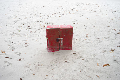 Abandoned red sand on beach