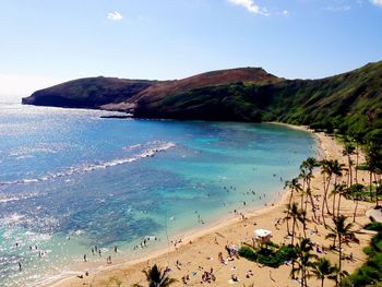 High angle view of tourists on beach