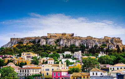 View of town against blue sky