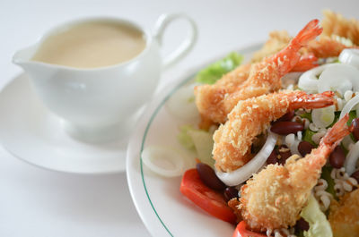 Close-up of served food in plate