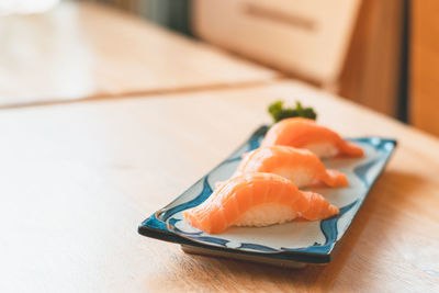 Close-up of fish served in plate on table