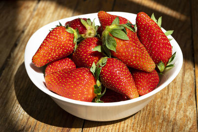 High angle view of strawberries on table