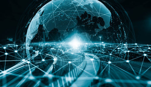 Close-up of illuminated electric light at night