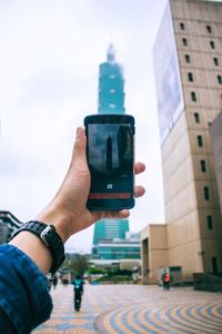 People walking on road in city