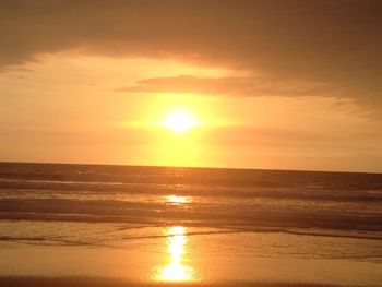 Scenic view of sea at sunset