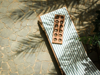 High angle view of rusty metal on wall