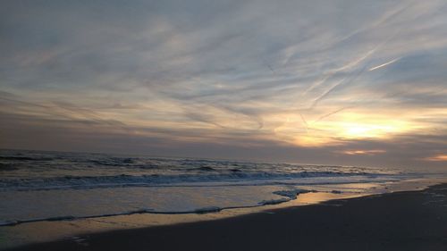 Scenic view of sea at sunset