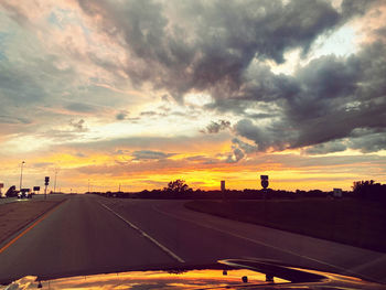 Road against sky during sunset