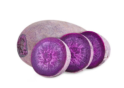 Close-up of purple fruit against white background