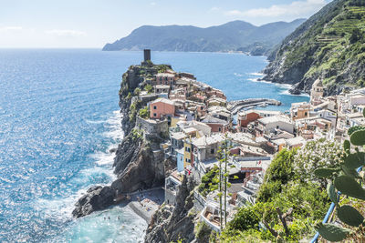 Aerial view of vernazza in the cinque terre with colorful houses and flowers