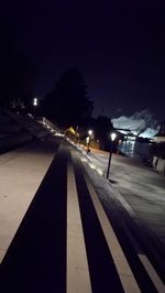 Illuminated street lights at night