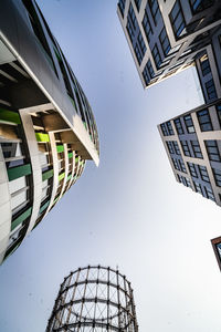 Low angle view of modern buildings against clear sky