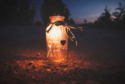 Close-up of illuminated lantern at night